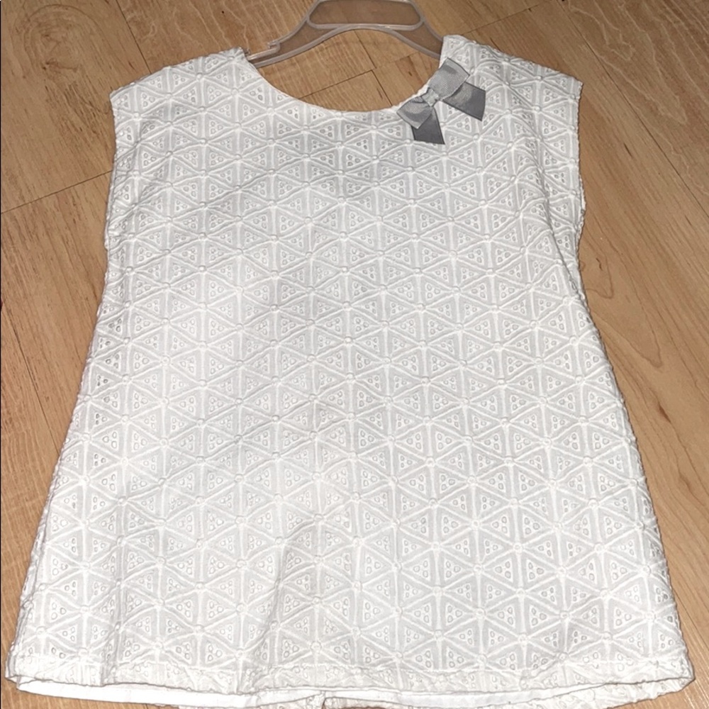 A White blouse with ribbons